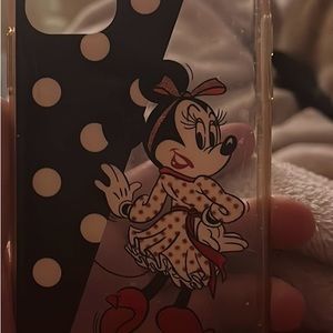 Kate Spade iPhone 11 case has some visible scratches from where in tear